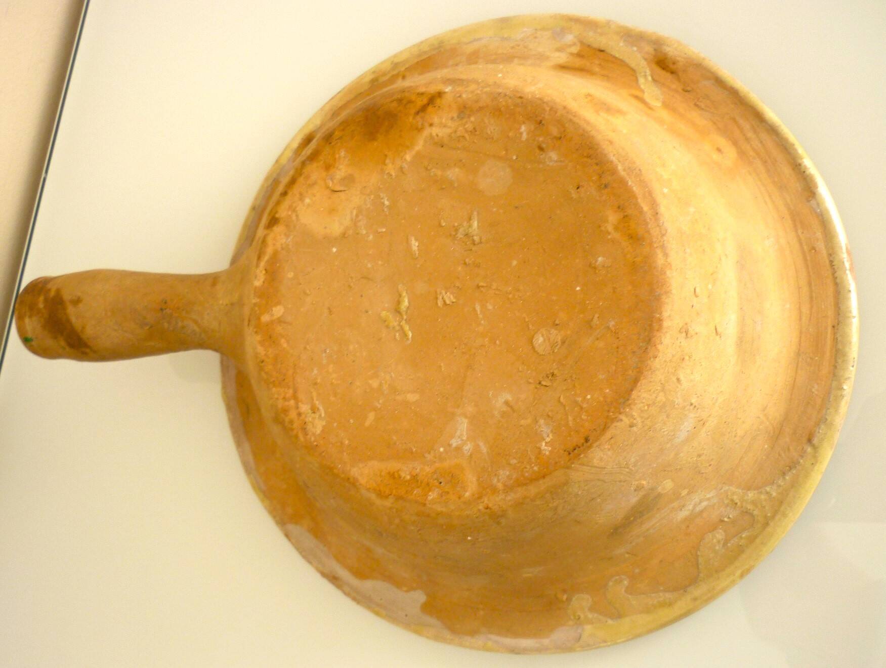Frying pan, old caquelon, yellow glazed earthenware from the south of France.