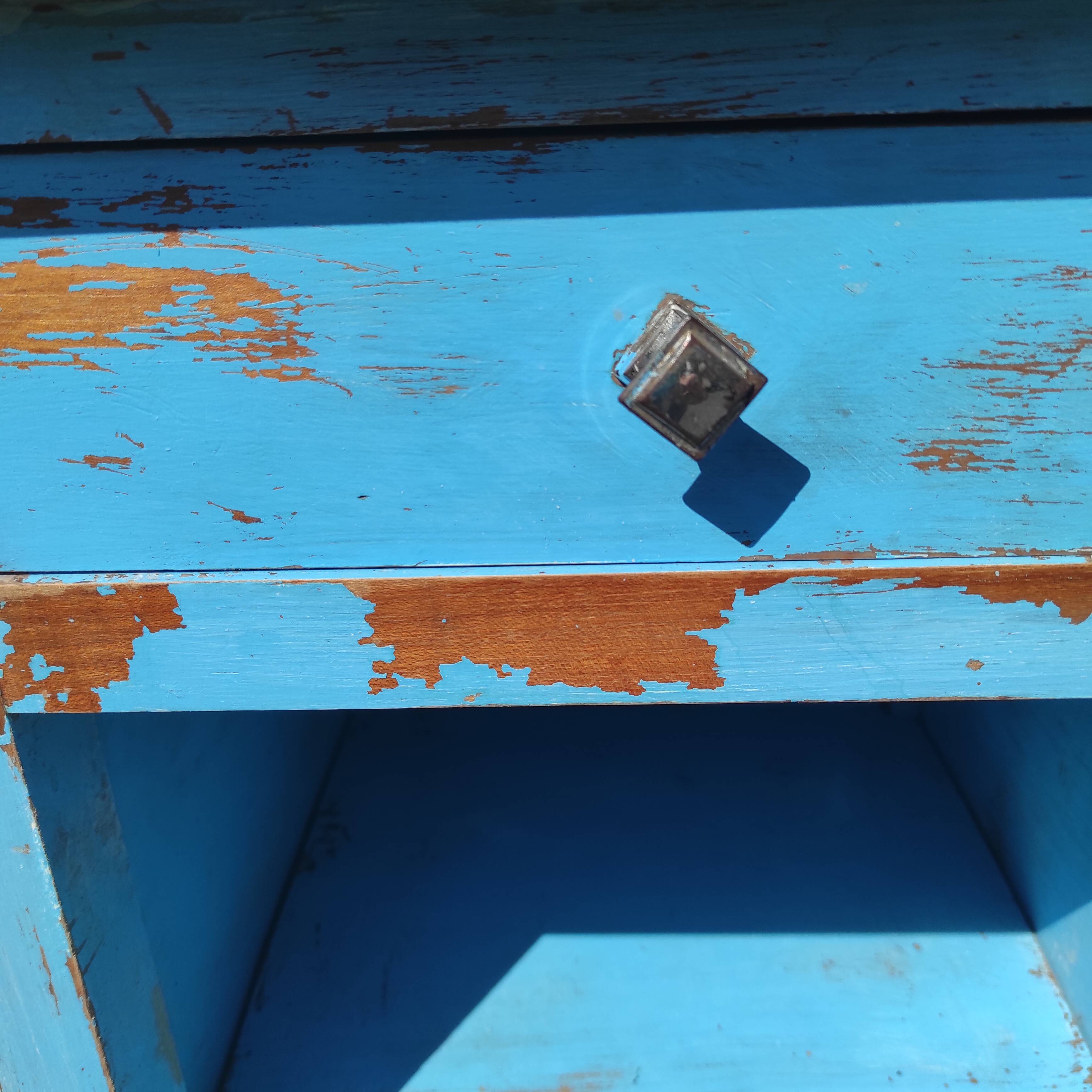 Old bedside table with 1 drawer and 1 door painted in lavender blue