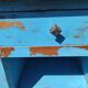 Old bedside table with 1 drawer and 1 door painted in lavender blue