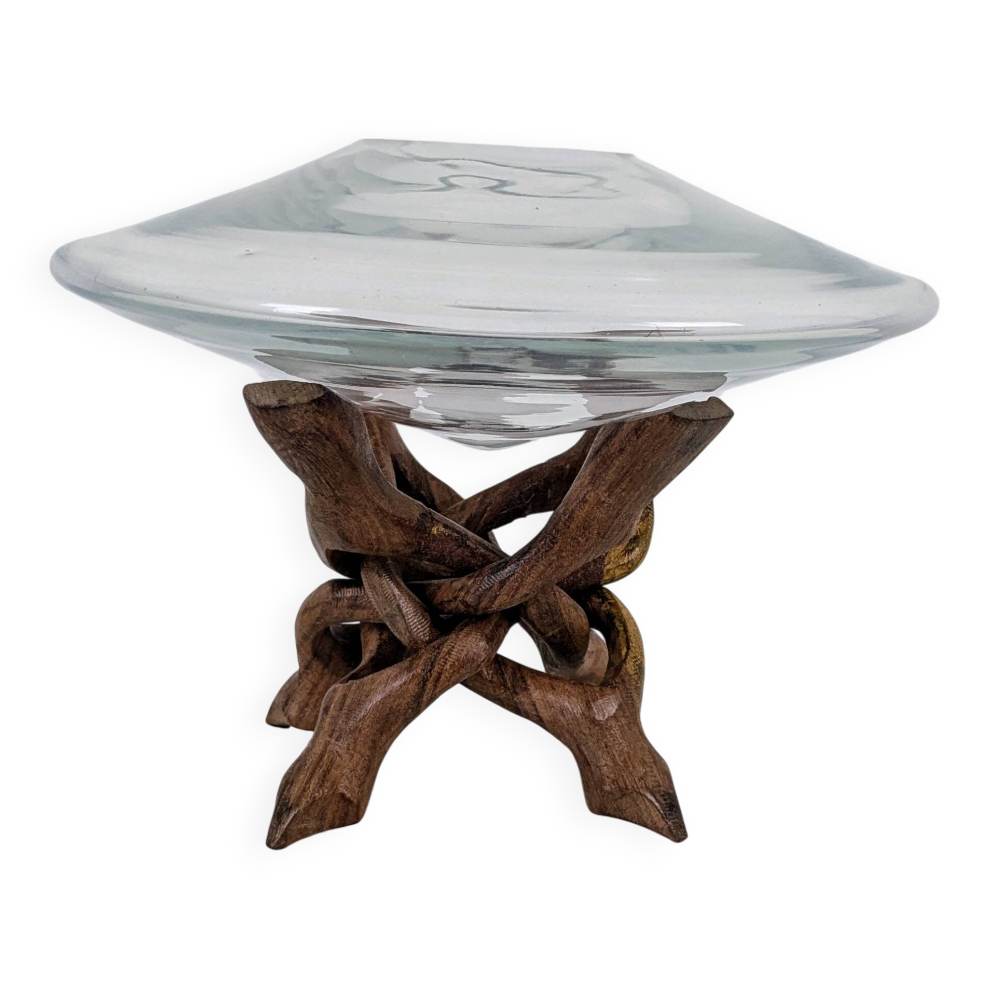 Glass cup molded on carved exotic wood