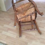 Wood and straw armchair