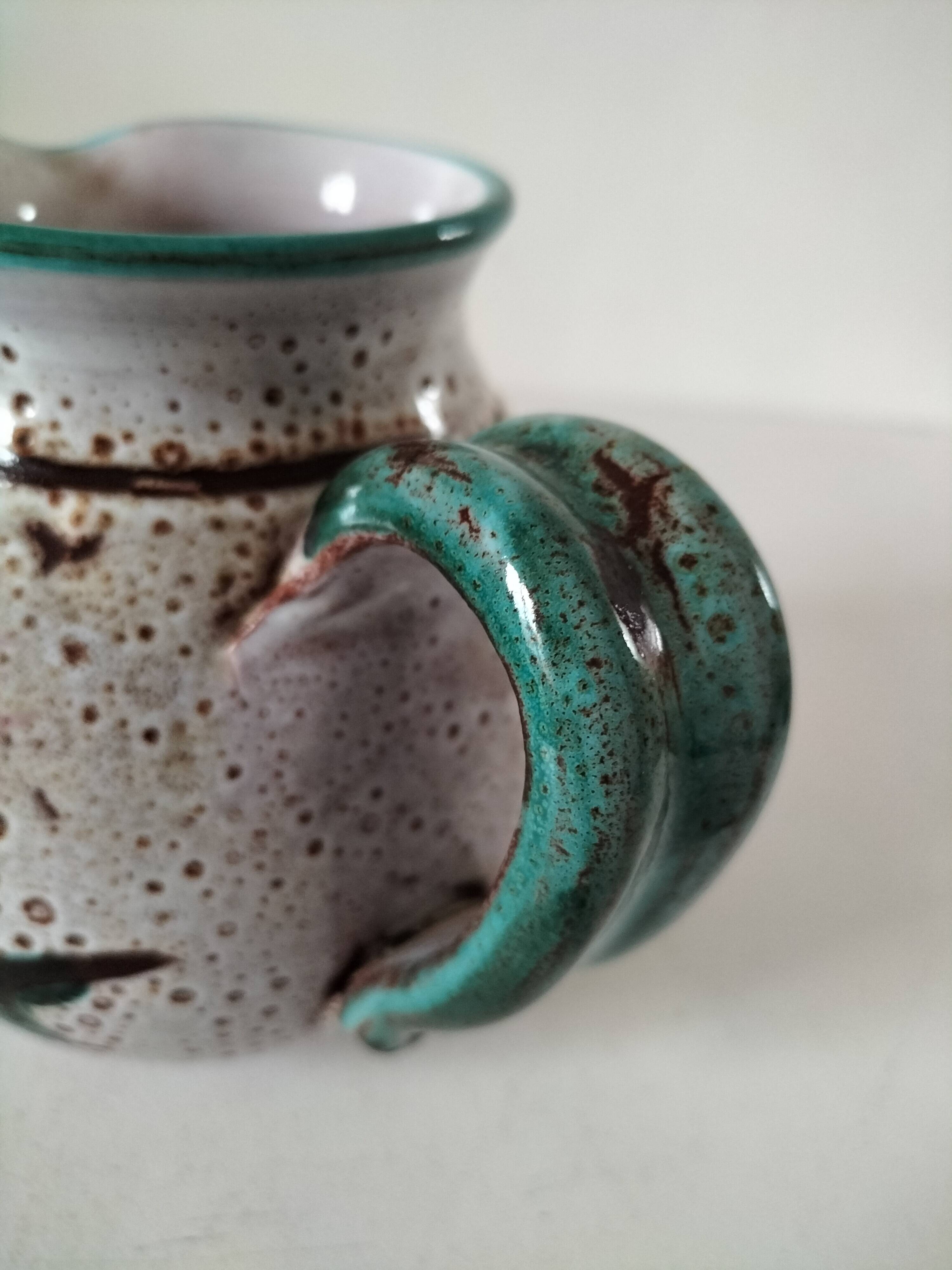 Pitcher with thistle motif by André Georges Pougues les Eaux