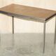 Modern mid-century writing desk signed Cartier in bronze and leather.