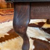 Vintage wooden and goatskin pouf