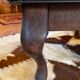 Vintage wooden and goatskin pouf