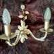 White glazed metal wall light with leaf and flower decor, 2 lights