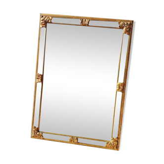 Mirror with beveled beads in gilded wood -