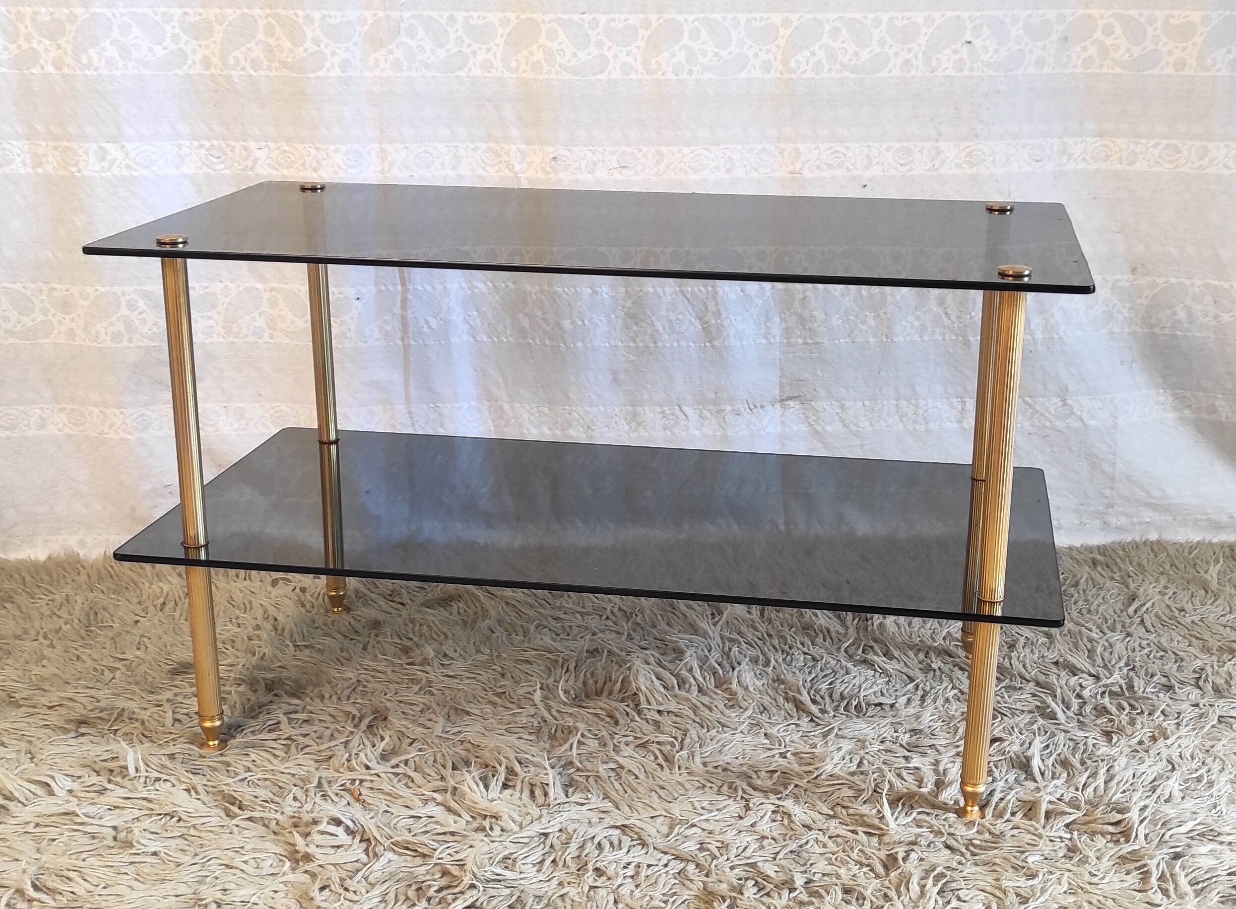 Coffee table in gilded metal and smoked glass – 60s