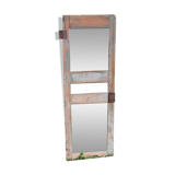 Mirror (3 panels) on door.