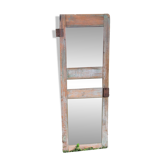 Mirror (3 panels) on door.