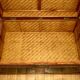 Beautiful vintage Chinese trunk in wicker, black and gold lacquered wood, and brass.