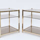 Pair of sofa tips in gilded metal and glass