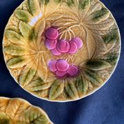 Together, four antique Sarreguemines barbotine plates.