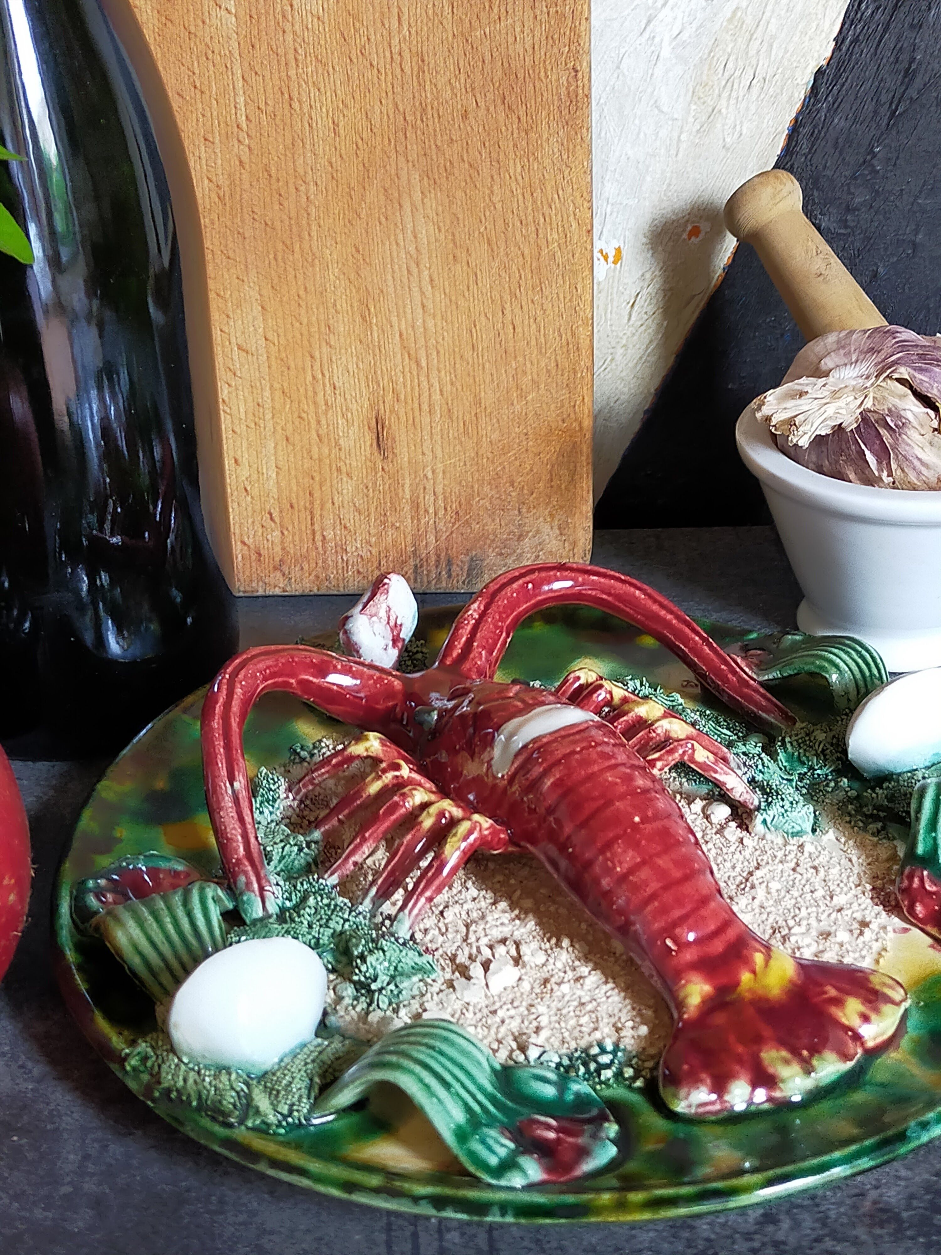 Plate in old barbotine with lobster