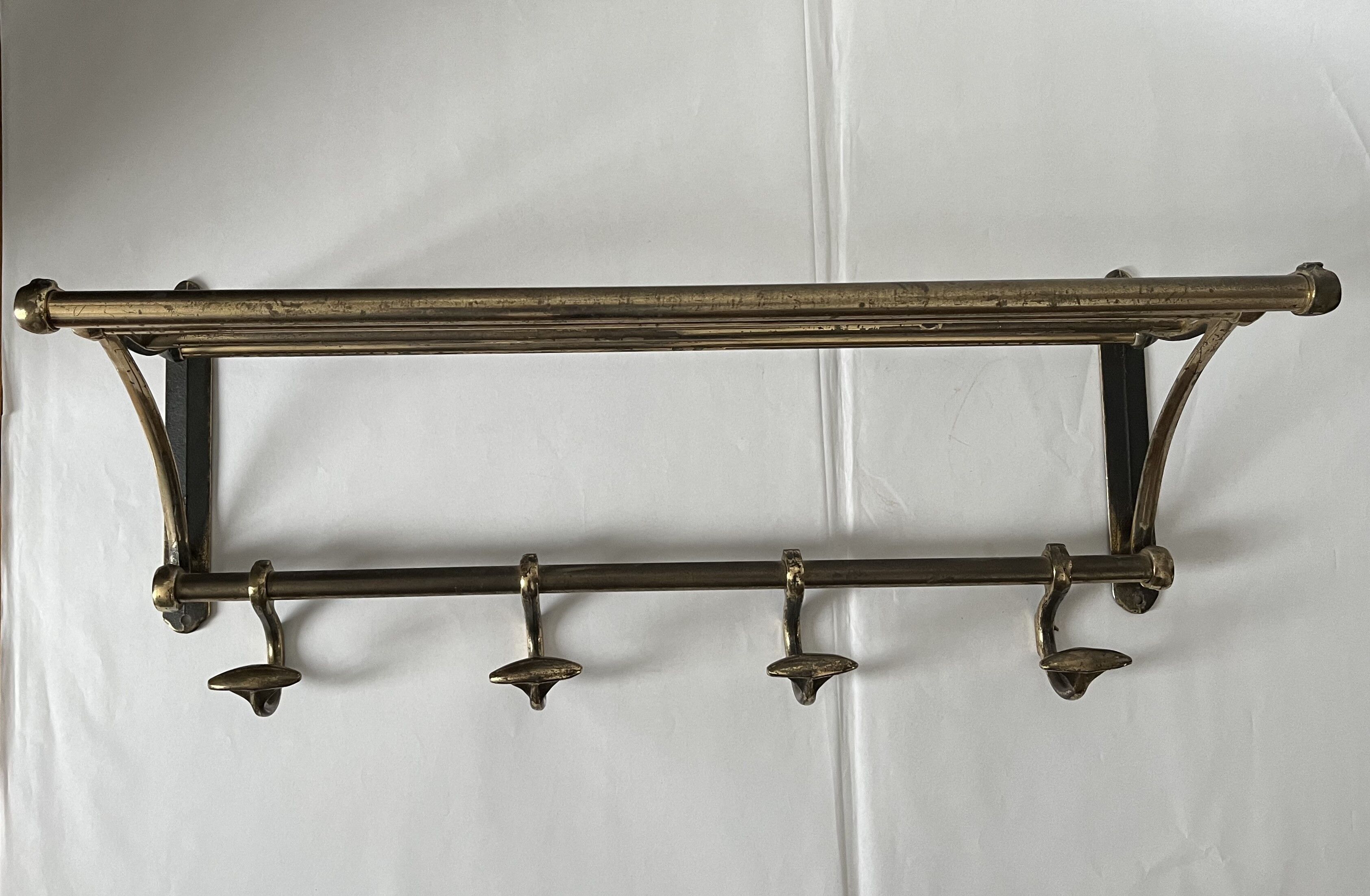 Antique coat rack in gilded metal