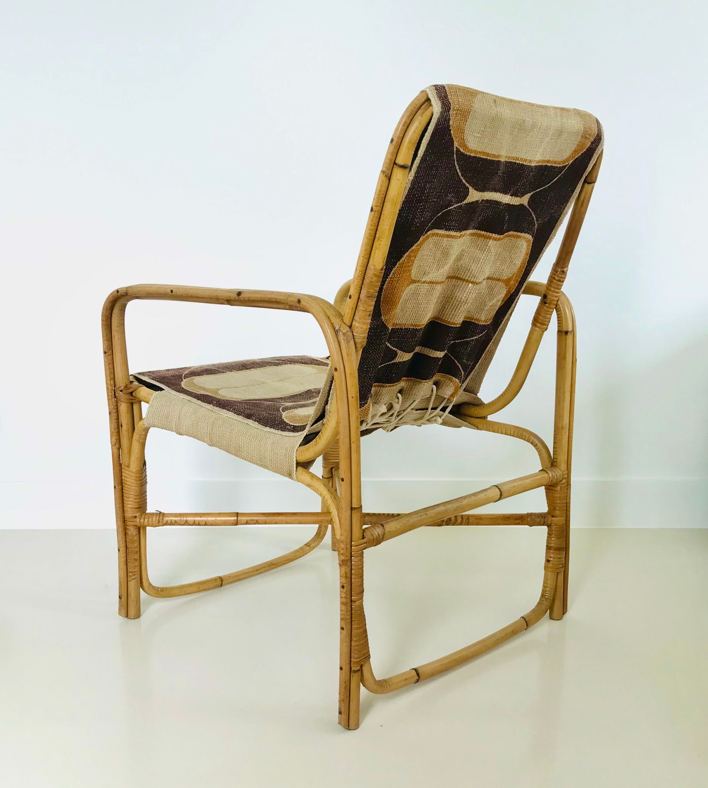 Rattan armchair and fabric, France 60s