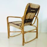 Rattan armchair and fabric, France 60s