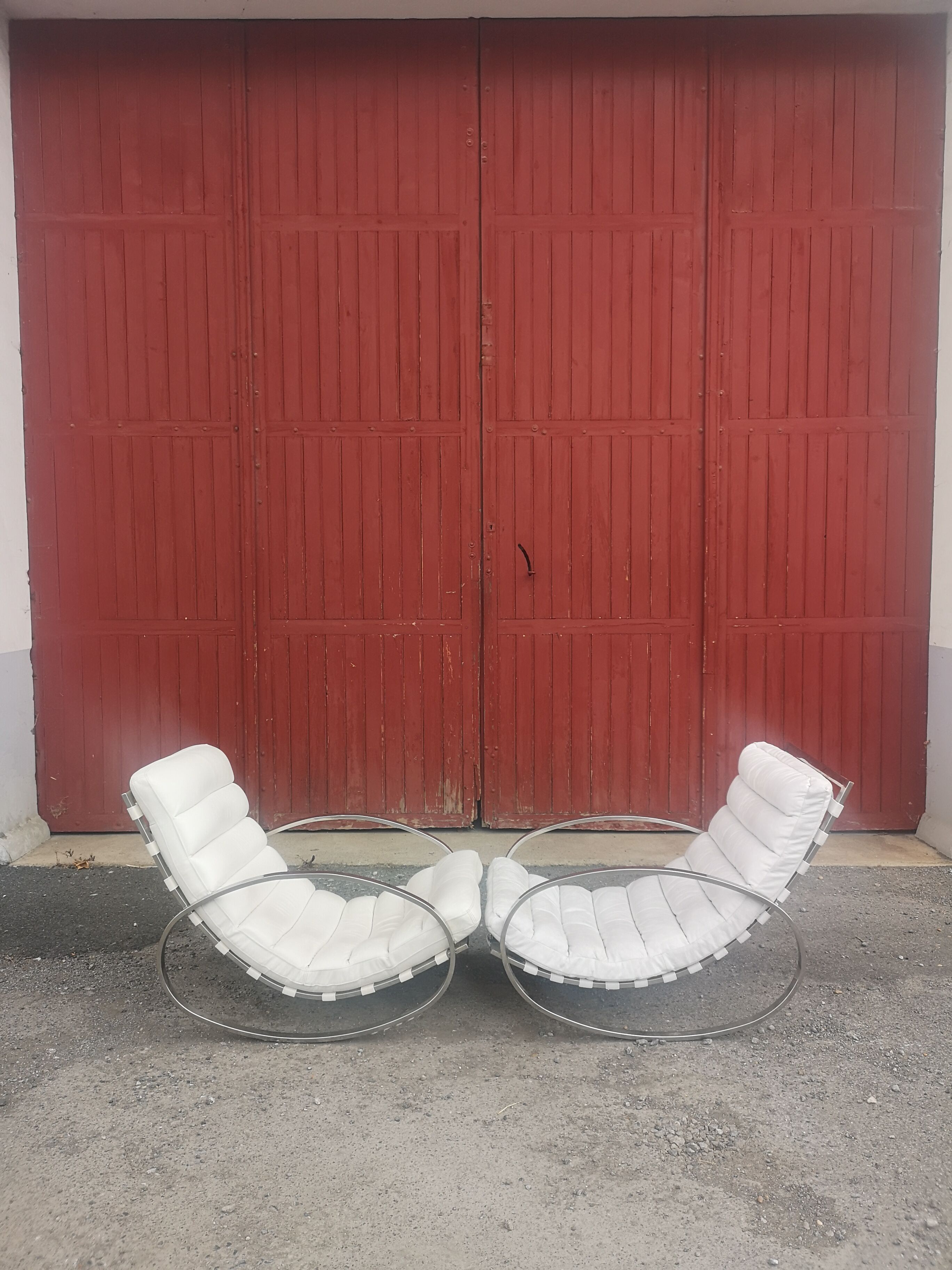 Pair of vintage chrome and leather rocking chairs