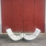 Pair of vintage chrome and leather rocking chairs