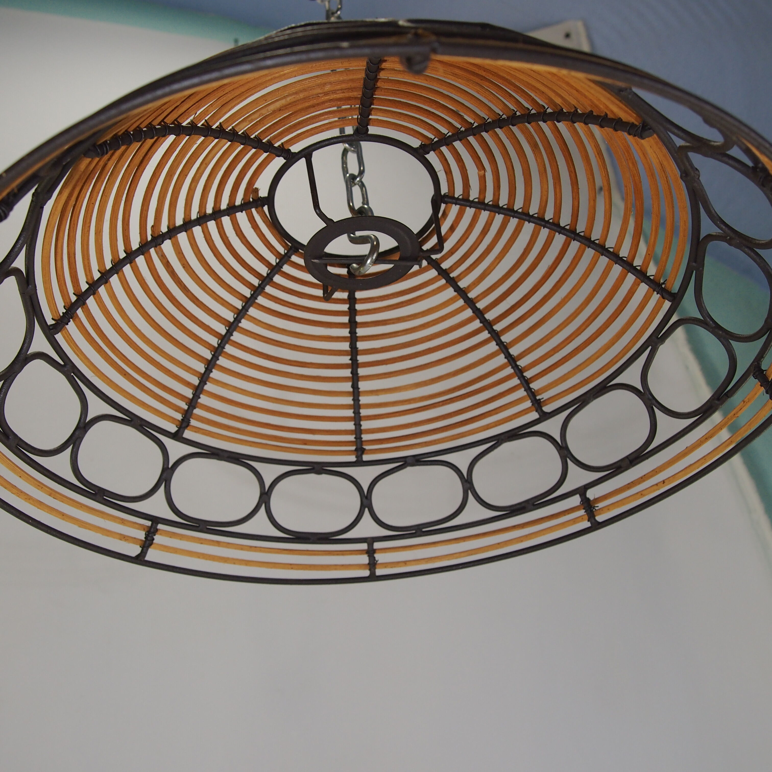 Rattan and wrought iron hanging lamp