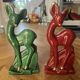 Pair of Art Deco deer by Charles Lemanceau in red and green ceramic.