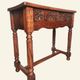 Castilian console table in carved walnut, early 20th century.