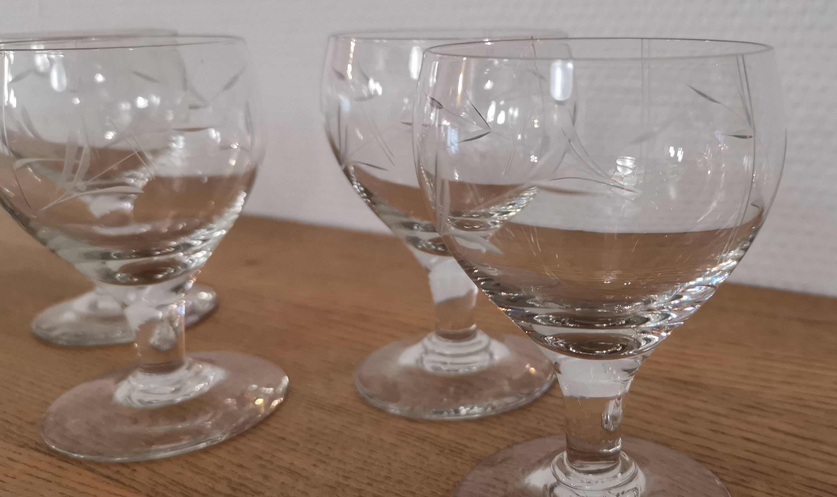 Set of 7 finely engraved vintage wine glasses