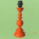 Large vintage lamp base in orange lacquered wood