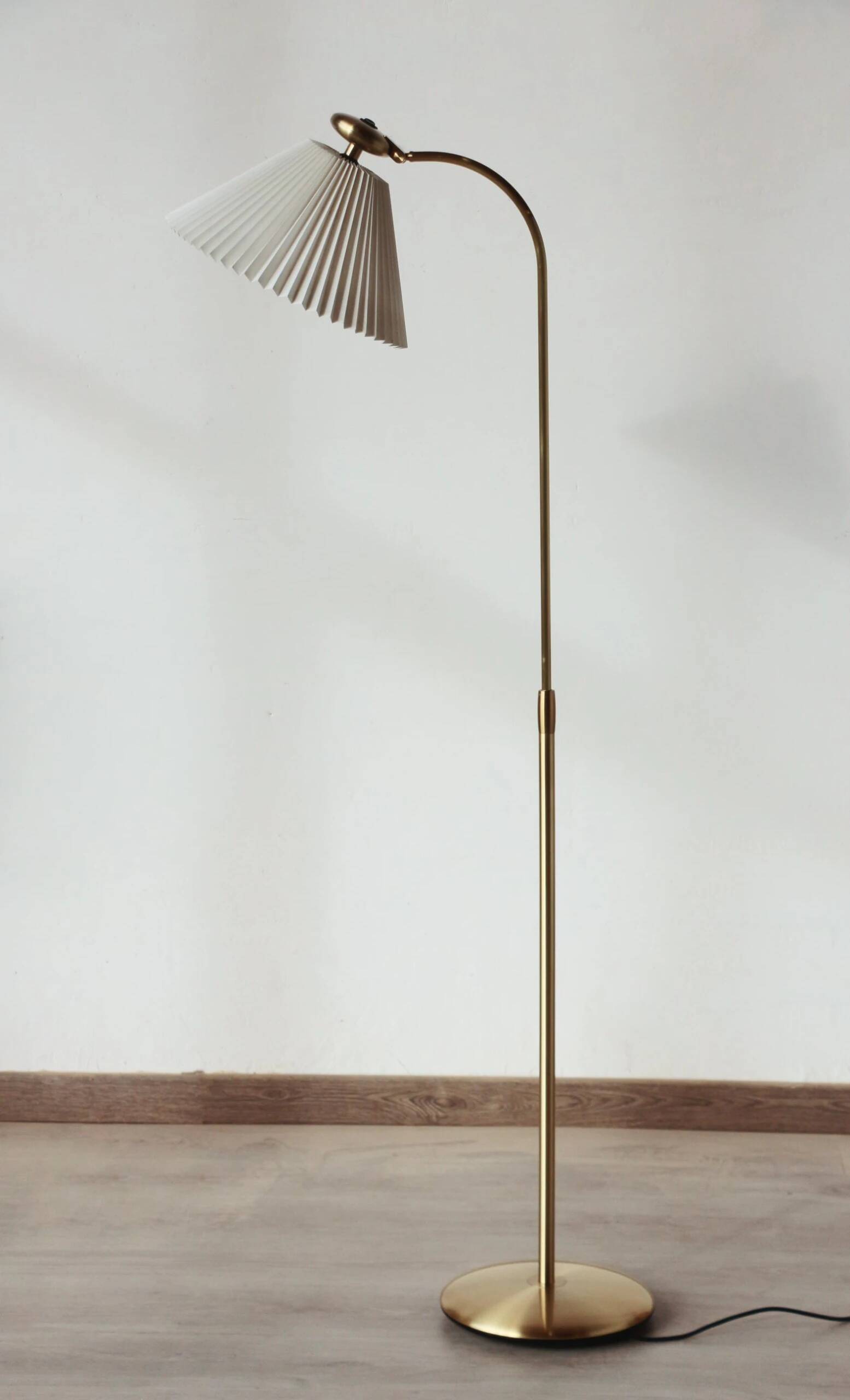 Le Klint 340 floor lamp in brass – design by Philip Bro Ludvigsen