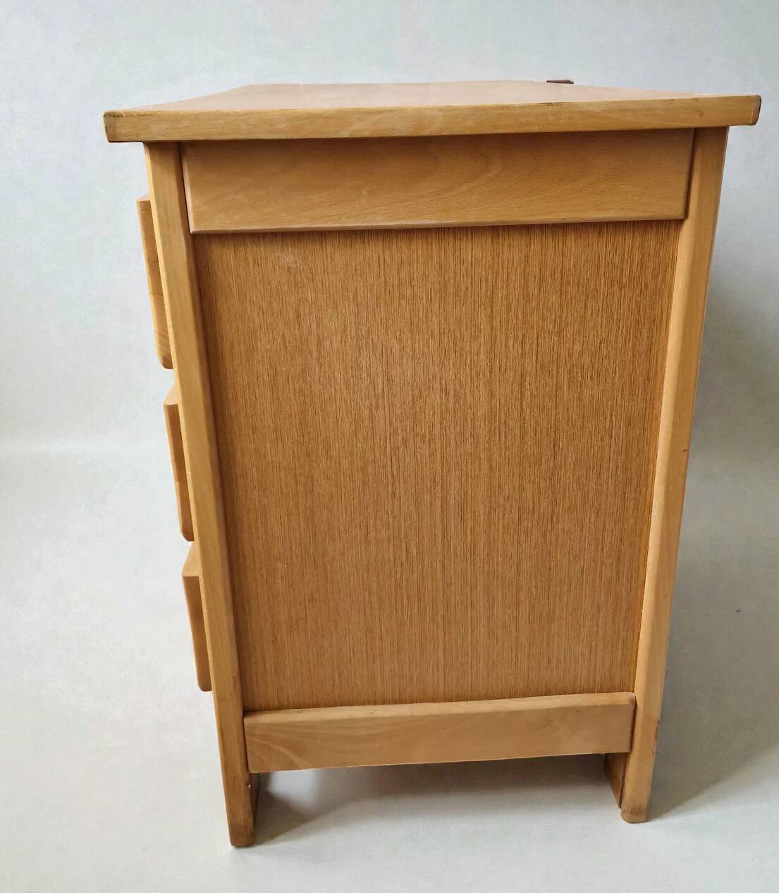 Commode style with rounded edges.