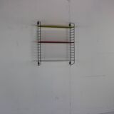 Minimalistic fifties metal metal wall system for Tomado Holland