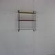 Minimalistic fifties metal metal wall system for Tomado Holland