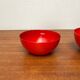 Modern mid-century red enamel bowl sets by Kaj Franck for Finel, Finland, 1960s, set of 4.