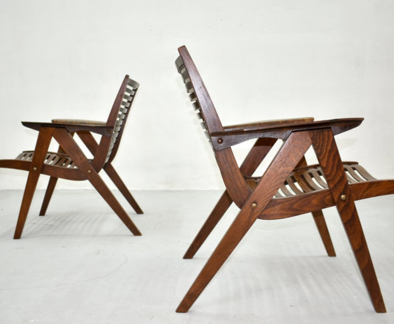Chairs designed by Niko Kralj produced by Stol Slovenia