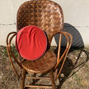 Vintage 1970s armchair in curved woven chestnut + seat cushion