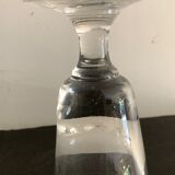 12 old glasses on foot at bistro or absinthe