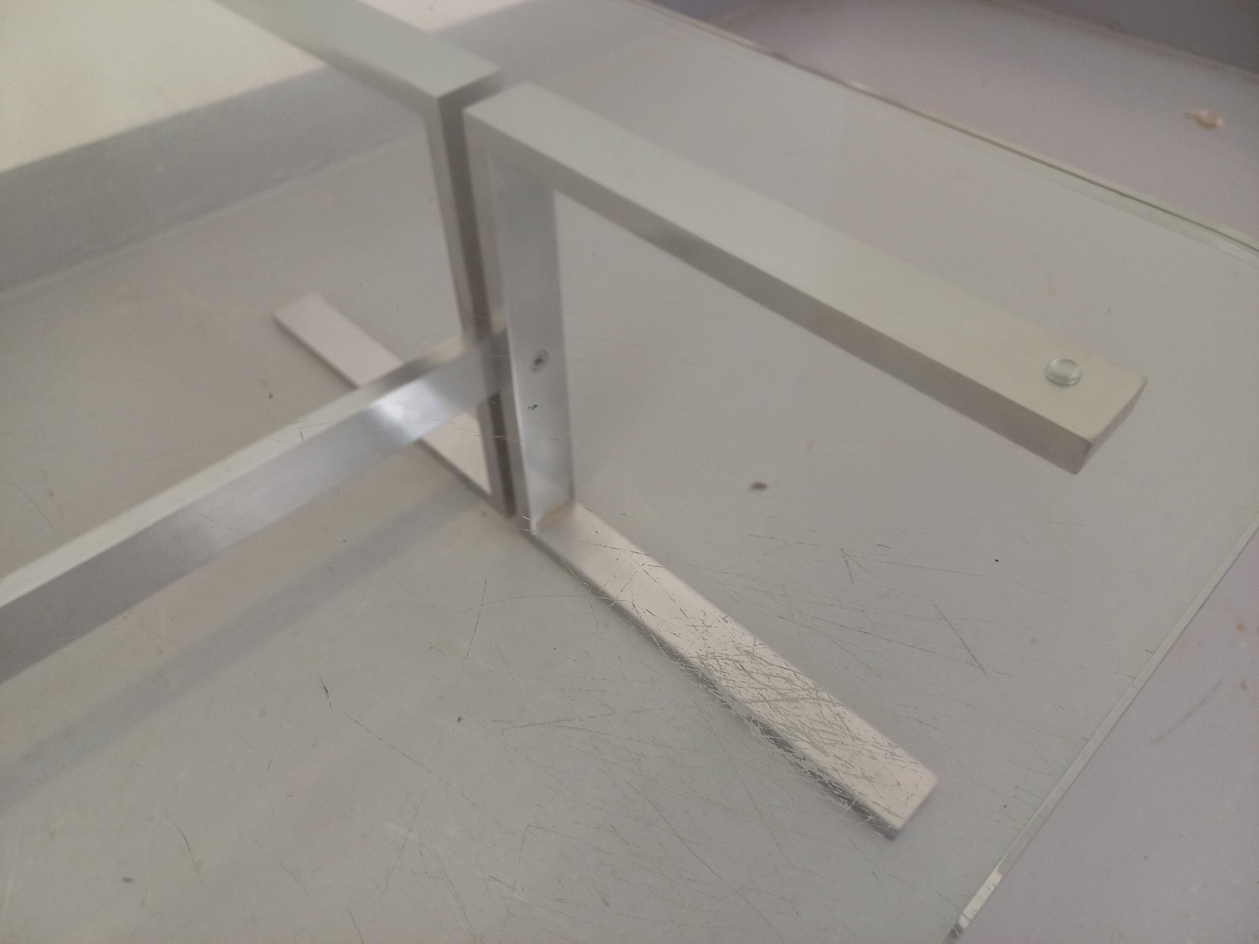 Vintage coffee table in transparent glass and cast aluminum from the 70s