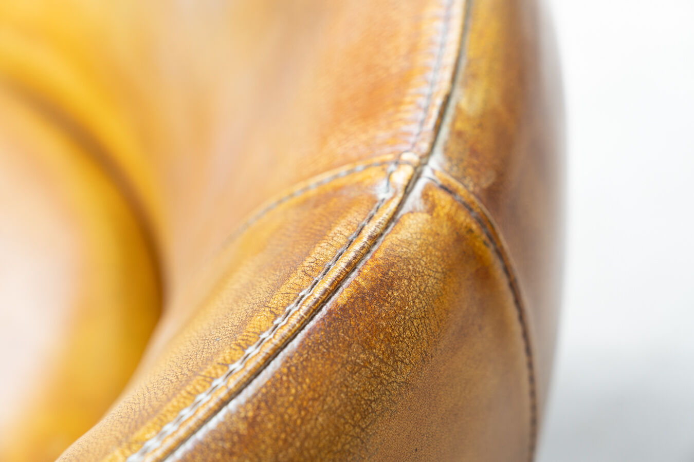 Leather swivel armchairs, early twenty-first century, set of 2