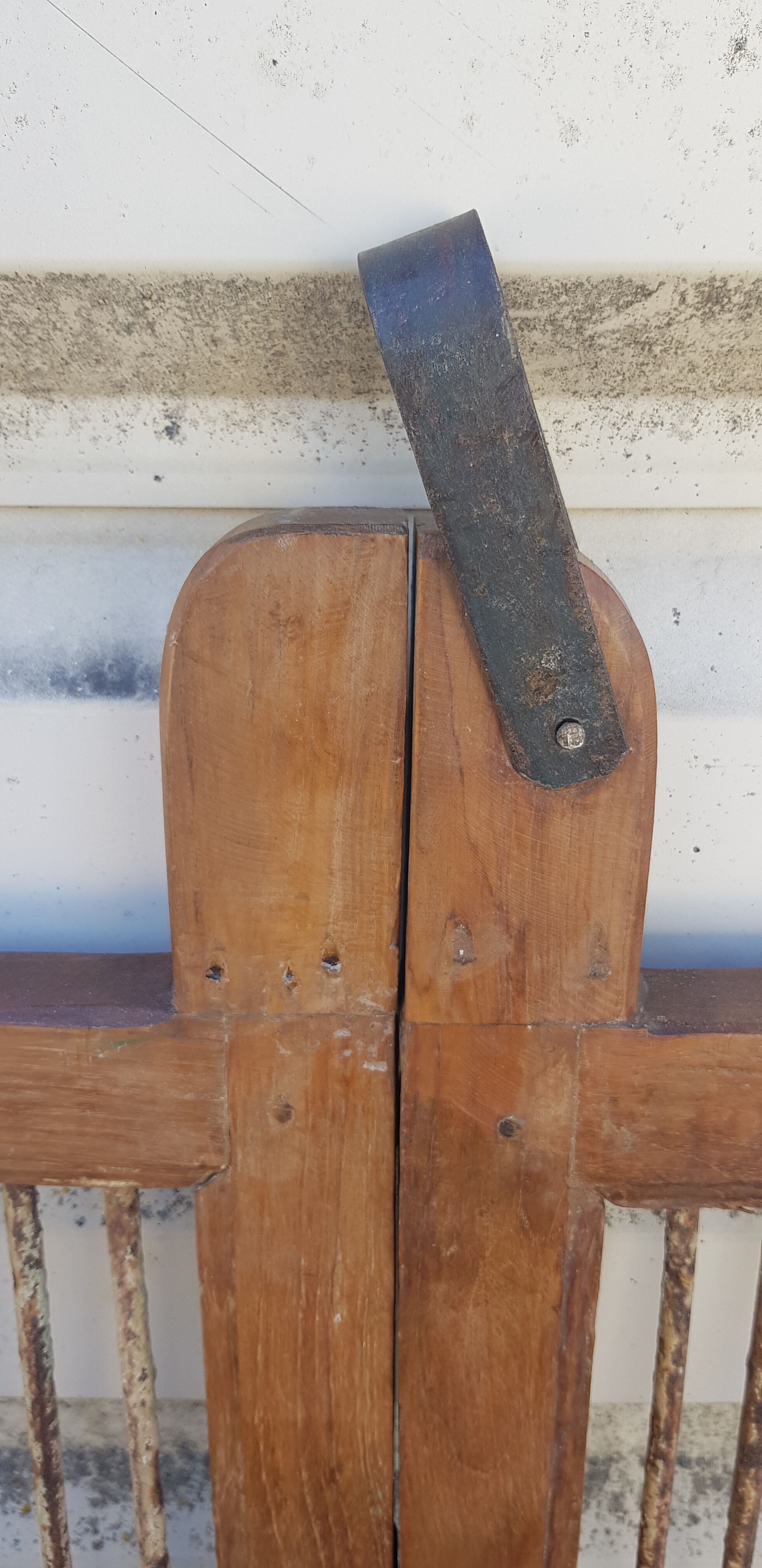 Old teak and wrought iron gate