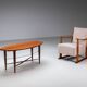 Assymetrical coffeetable with glass storage and cross leg details