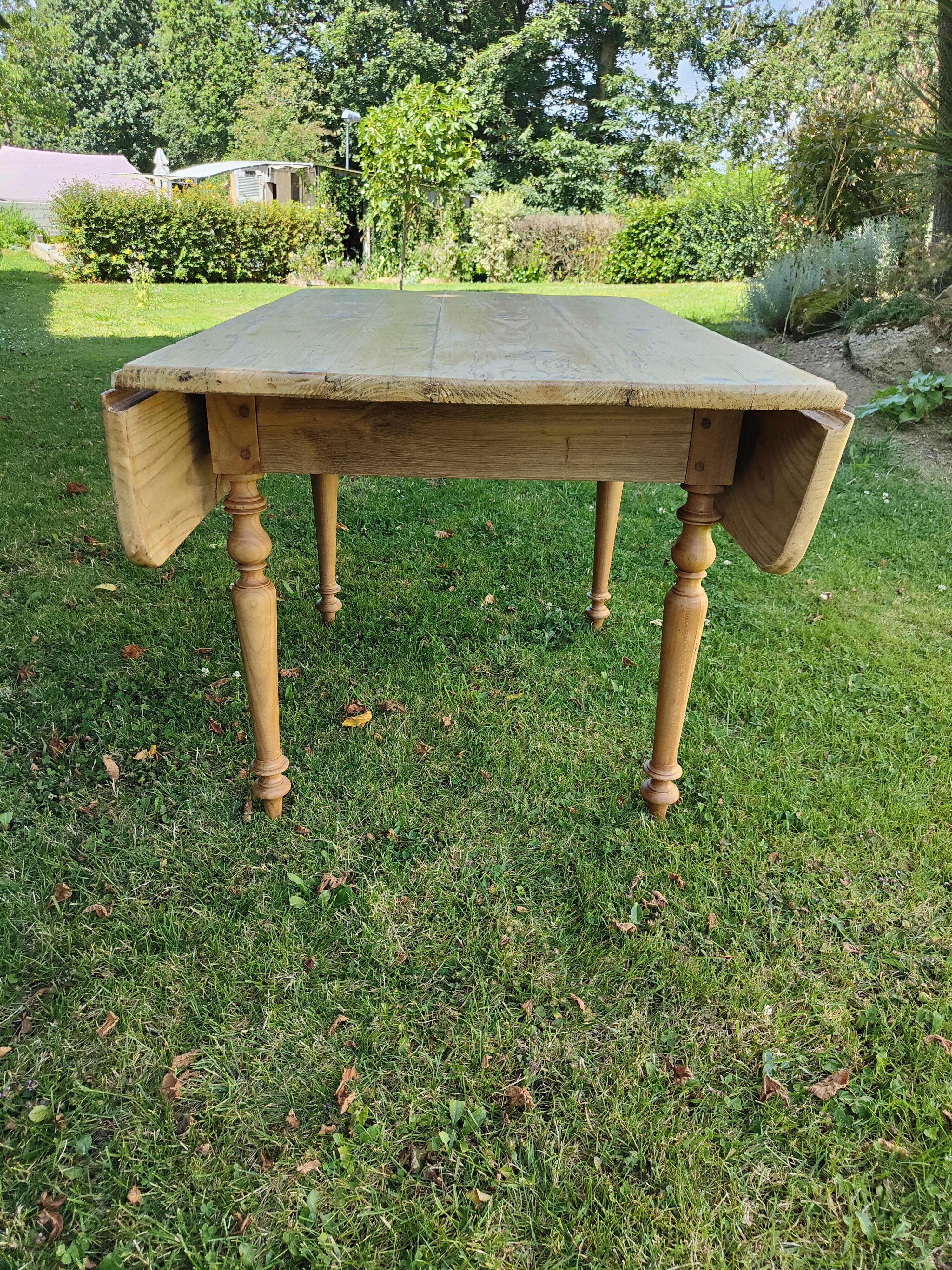 Wooden drop-leaf table