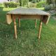 Wooden drop-leaf table