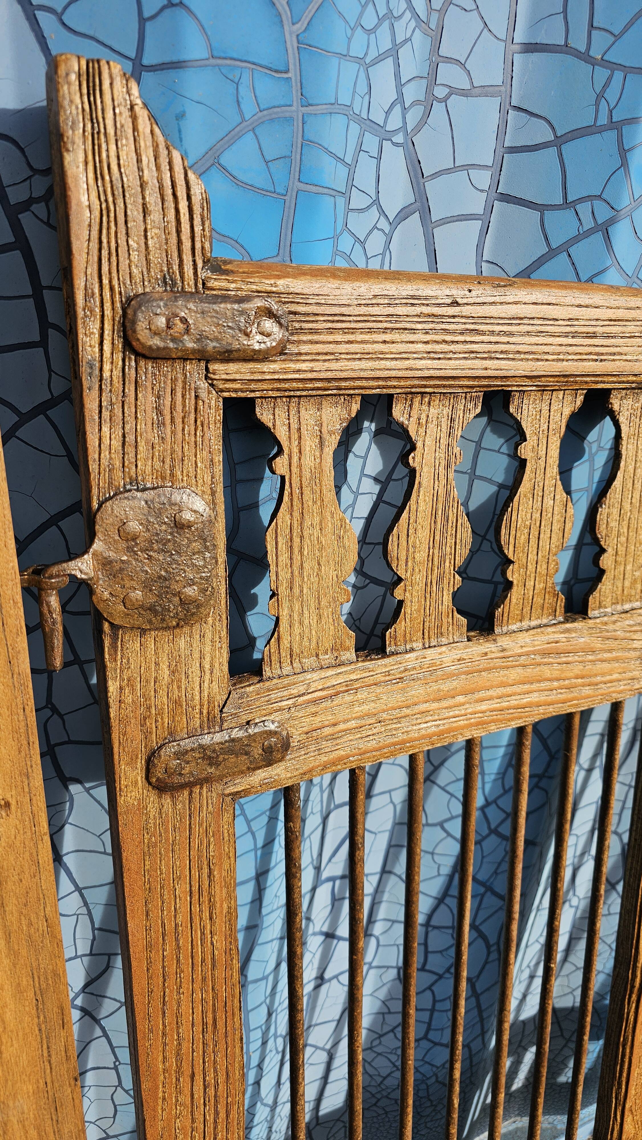 Old garden gate in solid teak