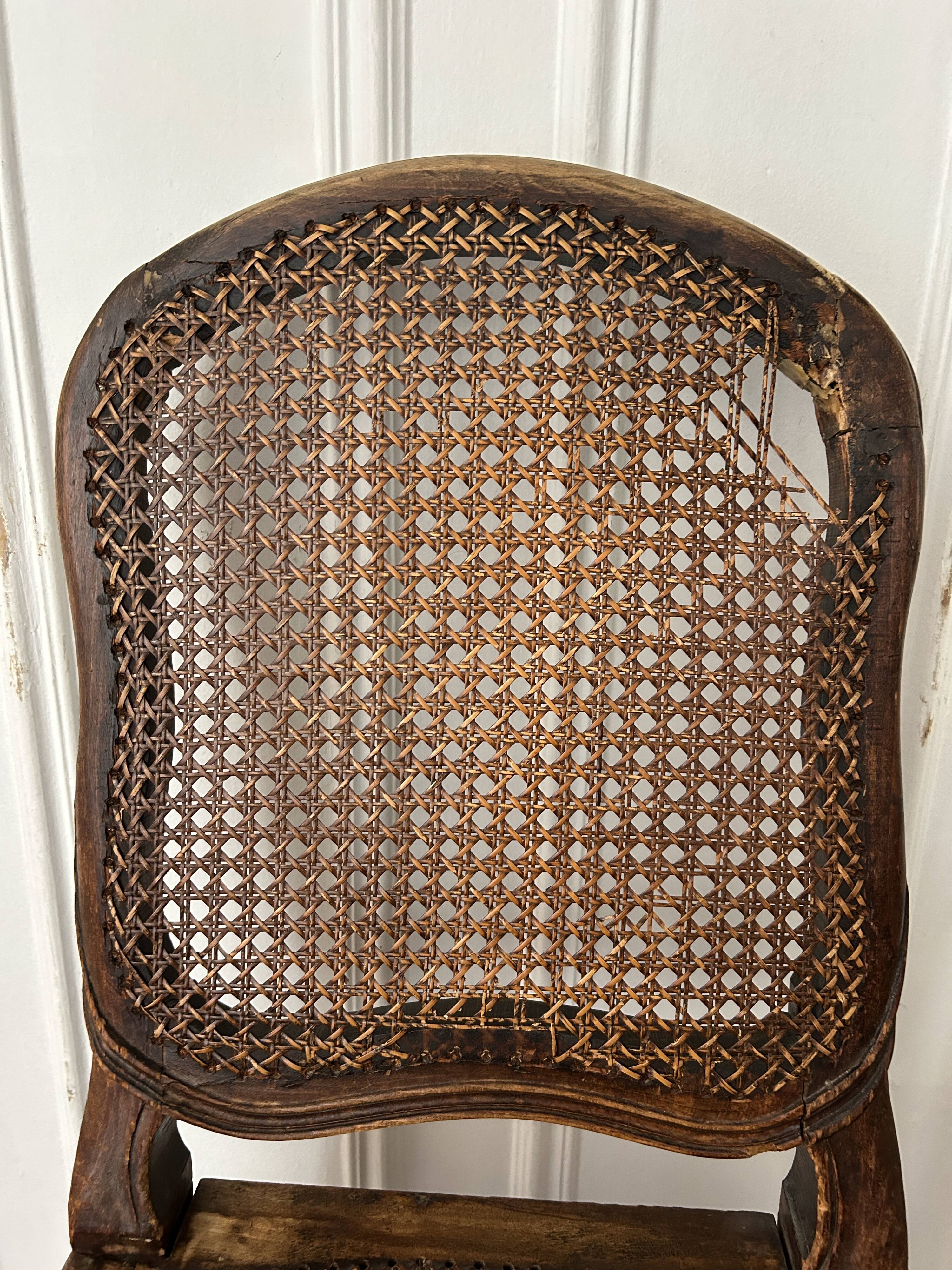 Antique Louis XV chair – molded natural wood / cane base