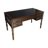 Classic wooden minister's desk with a bottle green leather desk pad.