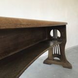 Art and Crafts style organ bench in solid oak.