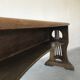 Art and Crafts style organ bench in solid oak.