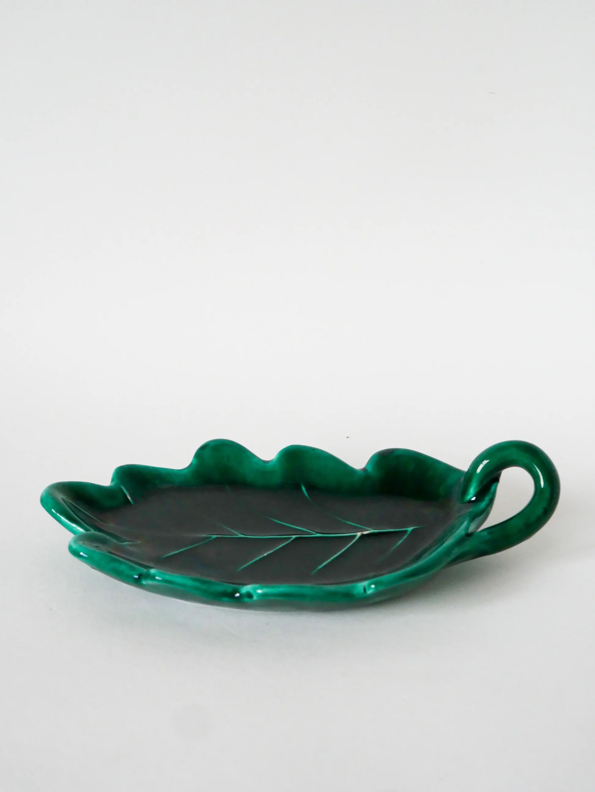 Large earthenware catchall, "Leaf" model, green, design, 1970.