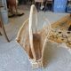 Antique wicker magazine rack