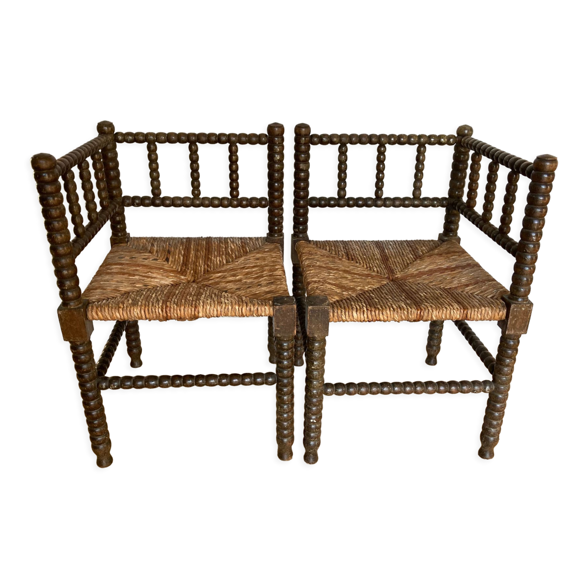 Turned wood corner armchairs